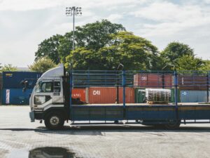 Veena Packers & Movers insured moving truck transporting household goods in Mumbai